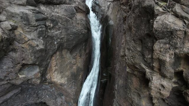 Aerial view of the Charco Azul waterfall after heavy rains in Agaete, Canary Islands, Spain