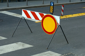 Traffic signs on empty street road outside