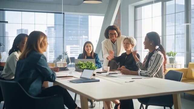 creative business team meeting together in open office with natural daylight