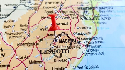Naklejka premium View of Maseru, is the capital and largest city of Lesotho, on a geographical map of Africa, marked with red push pin