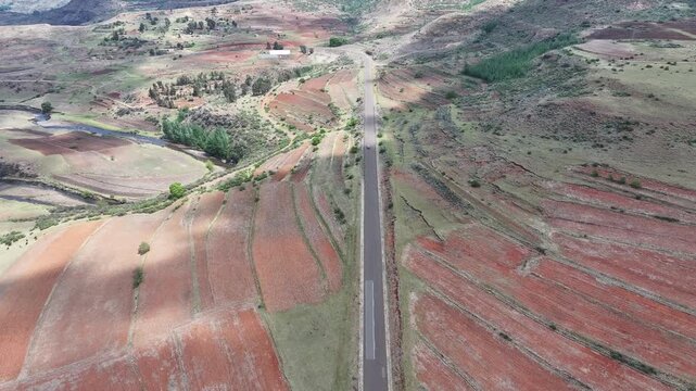 Aerial view of car driving along epic mountain roads in Lesotho, Africa
