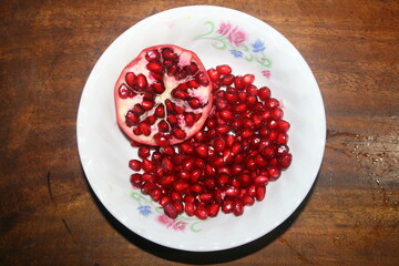 pomegranate seeds in a bowl