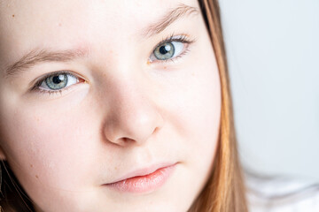 Obraz premium Close-up portrait of a little teenage girl. High quality photo