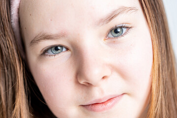 Obraz premium Close-up portrait of a little teenage girl. High quality photo