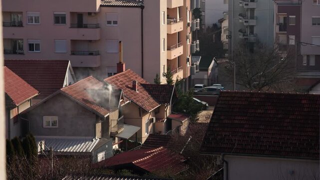 View With Chimney Smoke In Cold City Neighborhood
