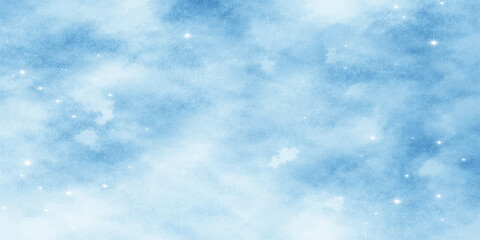 A beautiful clear blue sky features fluffy white cumulus clouds drifting through a sunny summer atmosphere to create a natural and bright heaven-like cloudscape