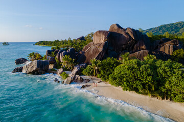 Stunning coastal view of Anse Source d'Argent beach on La Digue, Seychelles at sunset © Fokke Baarssen
