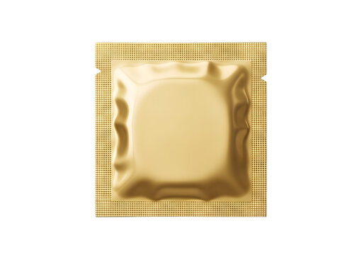 A single condom in a shiny gold foil wrapper  isolated on transparent background