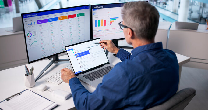 Man In Business Using CRM System