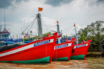Fototapeta premium Traditional wooden boat cruising on the Mekong River in My Tho, Vietnam
