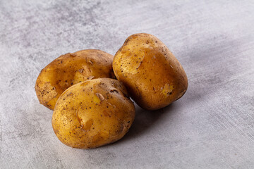 Fototapeta premium Raw potato heap for cooking