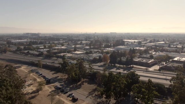 Detailed drone view of the South San Jose tech corridor and Highway 101. Features the intersection of nature, industry, and the fast-paced Silicon Valley infrastructure at 4K resolution.