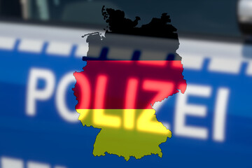 Flagge von Deutschland und ein Polizeiauto