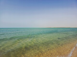Obraz premium the red sea in Egypt South Sinai at the daylight in summer, Natural panoramic empty shore with no people with sea waves hits the beach, selective focus