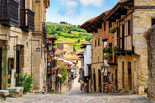 Main street that descends towards the church of the medieval village of Santillana del Mar in Cantabria, Spain.