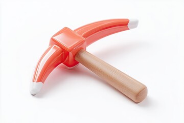 Naklejka premium A vibrant, orange-red pickaxe toy with a wooden handle, set against a bright white backdrop