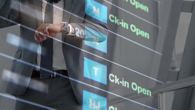 Flights delayed and canceled on departure board, flight delay footage. Device screen with airport flight information.