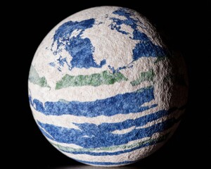 Earth Planet Sphere with Textured Surface Representing Global Geography for Science Education Assets Isolated on Dark Background with Artistic Paper Texture