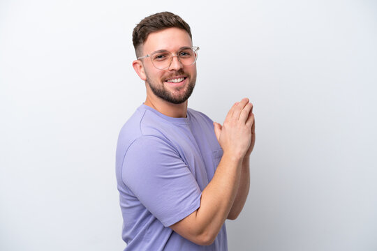 Young caucasian man isolated on white background scheming something