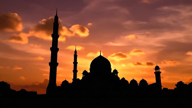 Silhouette of a mosque at sunset.