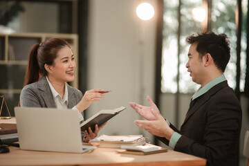 Obraz premium Professional Female Lawyer Consoling and Consulting Client in Law Office