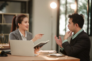 Fototapeta premium Professional Female Lawyer Consoling and Consulting Client in Law Office