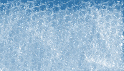 Creative bubble wrap texture &mdash; airy blue watercolor background in cloudy, sky tones. Transparent plastic bubbles &mdash; abstract mixed media composition for music covers, album art, contemporary design
