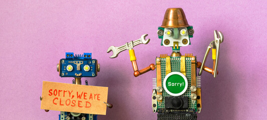 Naklejka premium Robots service workers. Fixing maintenance robotics electronic diagnostics concept. Funny repairman toys holds work tools pliers, hand wrench and poster with message Sorry we are closed