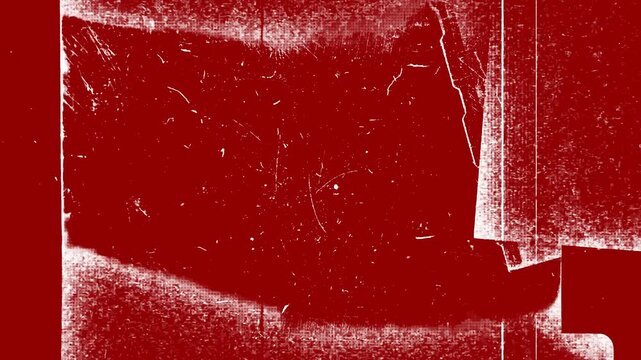The video combines saturated red colors with patches and lines of white. The grain, cracks, and scratches create a worn or rough feel.