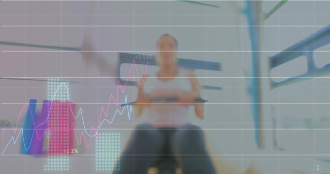 Woman in gym rower gripping bar and pulling while live graphs overlaying lower left tracking effort