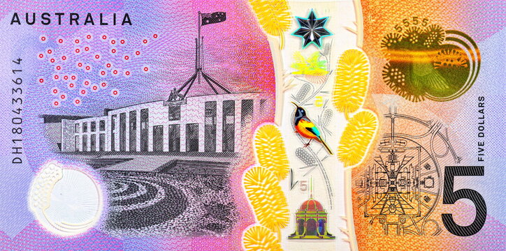 5 Dollars Australia with the image of the parliament building in the city of Canberra. Polymer money. Australian money.