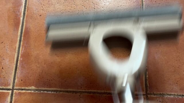 The mop washes the floor, video with sound.