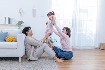 Family sharing joyful moments together in living room