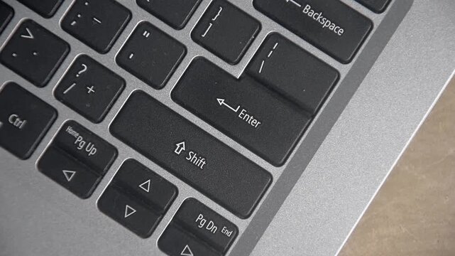 Press the enter key from the laptop keyboard