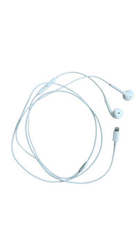White apple earpods with lightning connector on transparent background