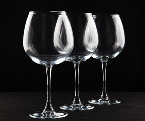 Still life with glass objects on a black background