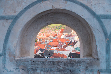 Breathtaking panoramic view of Cesky Krumlov old town with traditional orange rooftops and bohemian atmosphere