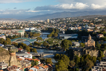 Tbilisi Cityscape With Peace Bridge Mtkvari River And Metekhi Church © Vadim Volodin