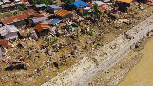Flood ruined homes along Mananga River after typhoon in Cebu Philippines