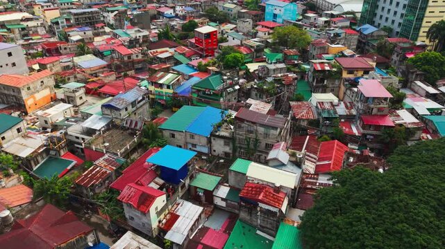Aerial view of dense slum rooftops in Taguig Metro Manila Philippines