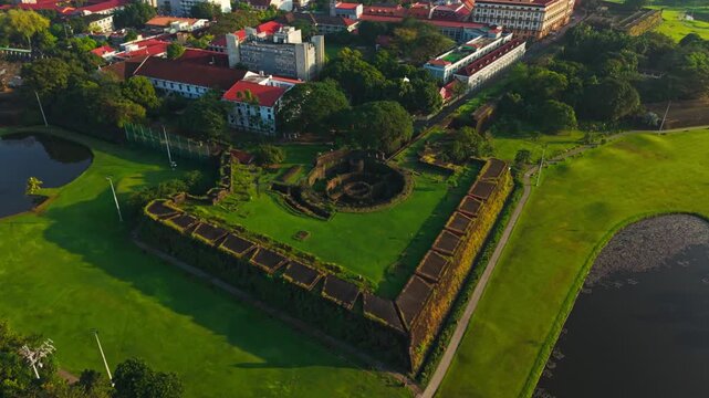 Orbiting drone flight above Baluarte De San Diego Intramuros Manila City