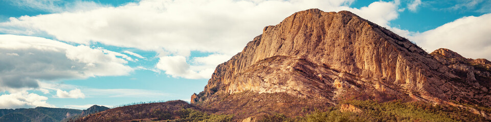 View of the mountain valley with the beautiful Mount Roc de Rombau. The Pyrenees Mountains. Peramola, Lleida, Spain © vvvita