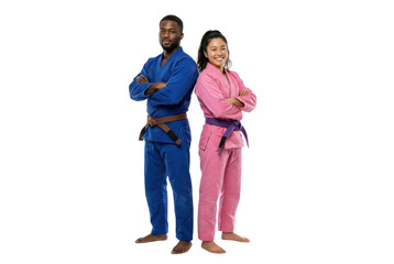 Obraz premium Back to back man and woman in blue and pink jiu jitsu gi uniforms with crossed arms, studio portrait for sports promotion, Isolated on white background