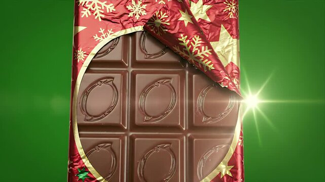Unwrapped Chocolate Bar with Christmas Themed Wrapper on Green Screen Background with Soft Lighting for Holiday