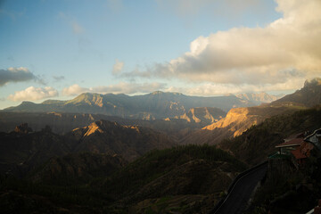 Panoramic sunset view of mountain valley and clouds © Stoca
