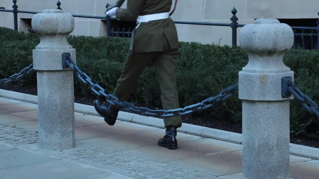 Soldier marching outdoors, showing discipline and focus