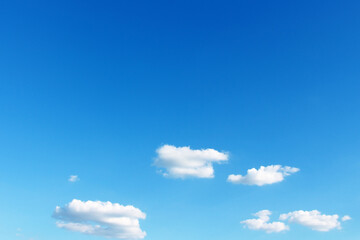 Blank sky surface with small clouds