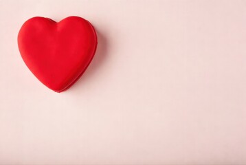 Fototapeta premium Red plastic heart shape on soft pink background minimalist love symbol