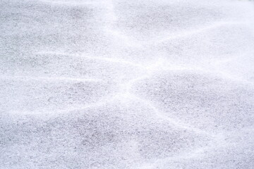 Obraz premium アスファルトにうっすら積もった雪のテクスチャ