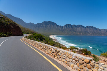 Viewpoint along the Whale Coast Route overlooking Kogel Bay Beach, with clear blue skies and perfect weather, capturing relaxed South African holiday vibes. © Remo Peer